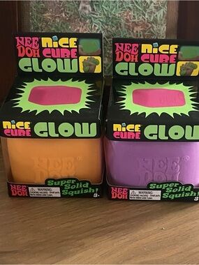 Nee Doh Nice Cube Glow Super Solid Squish - Orange and Purple